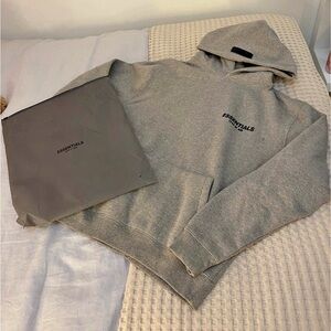 New Essentials Hoodie with dust bag and tags